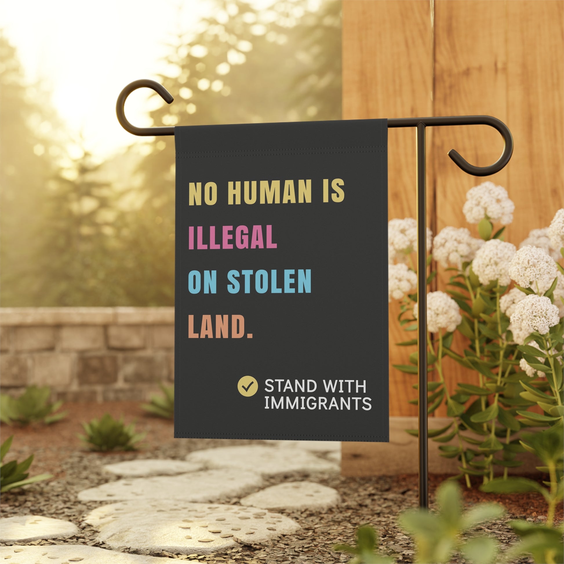 No Human is Illegal on Stolen Land Pro Immigrant Flag