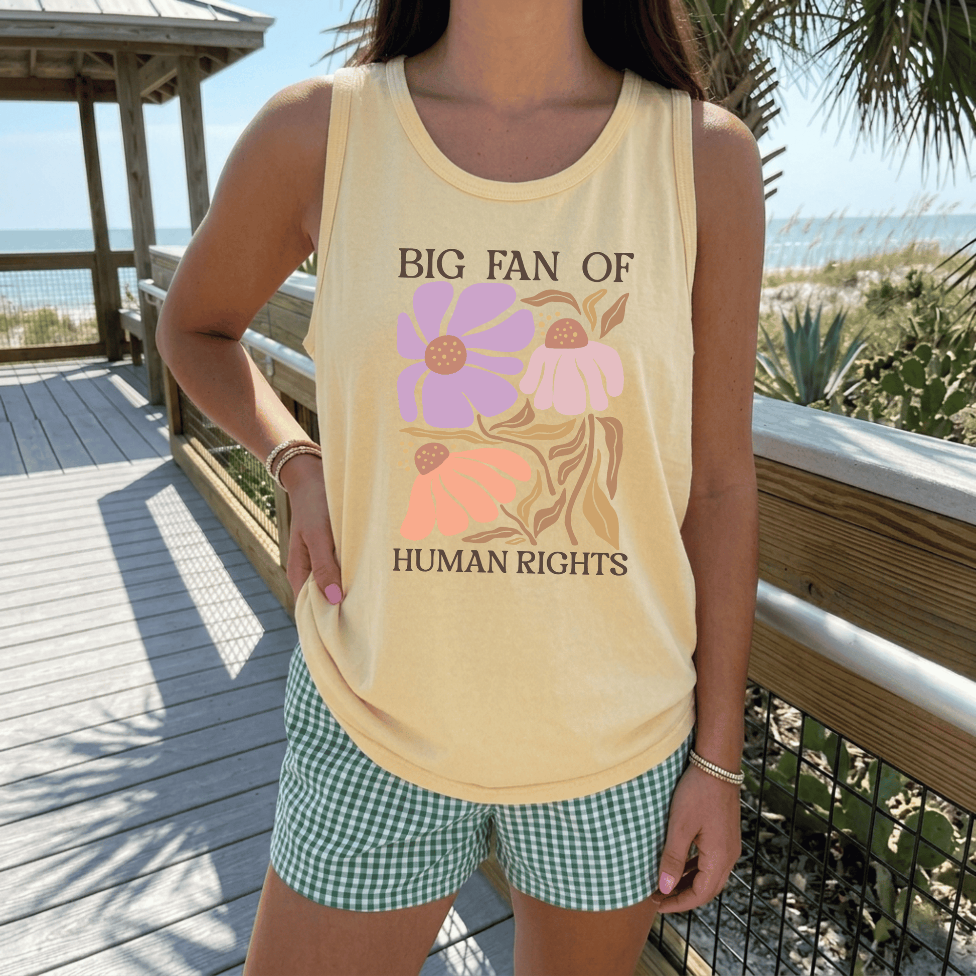 Big Fan of Human Rights floral tank top featuring retro purple and peach flowers on Comfort Colors butter yellow tank