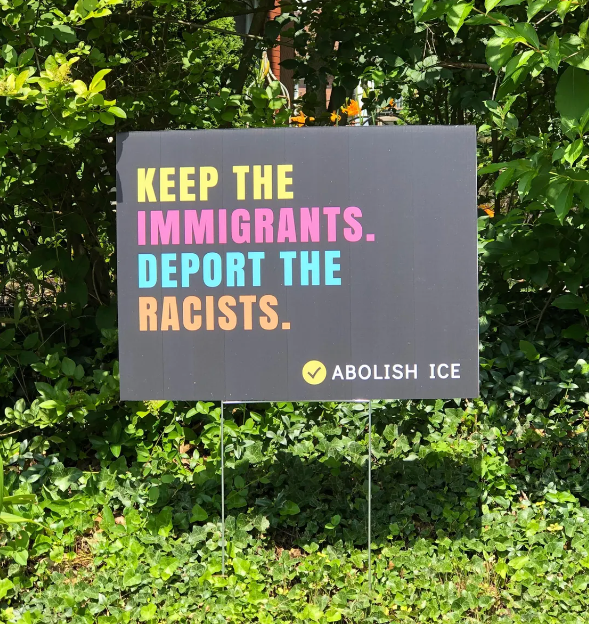Keep the Immigrants, Deport the Racists Yard Sign