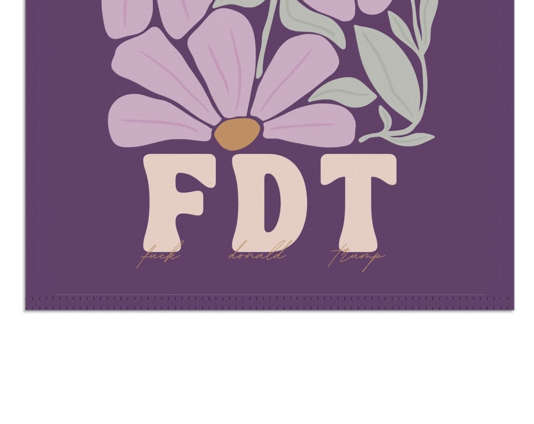 Purple garden flag with floral design and 'FDT' text 