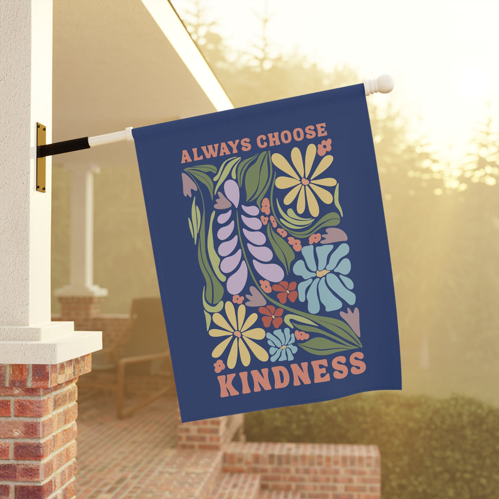 Decorative garden flag with floral design and 'Always Choose Kindness' text on a porch.