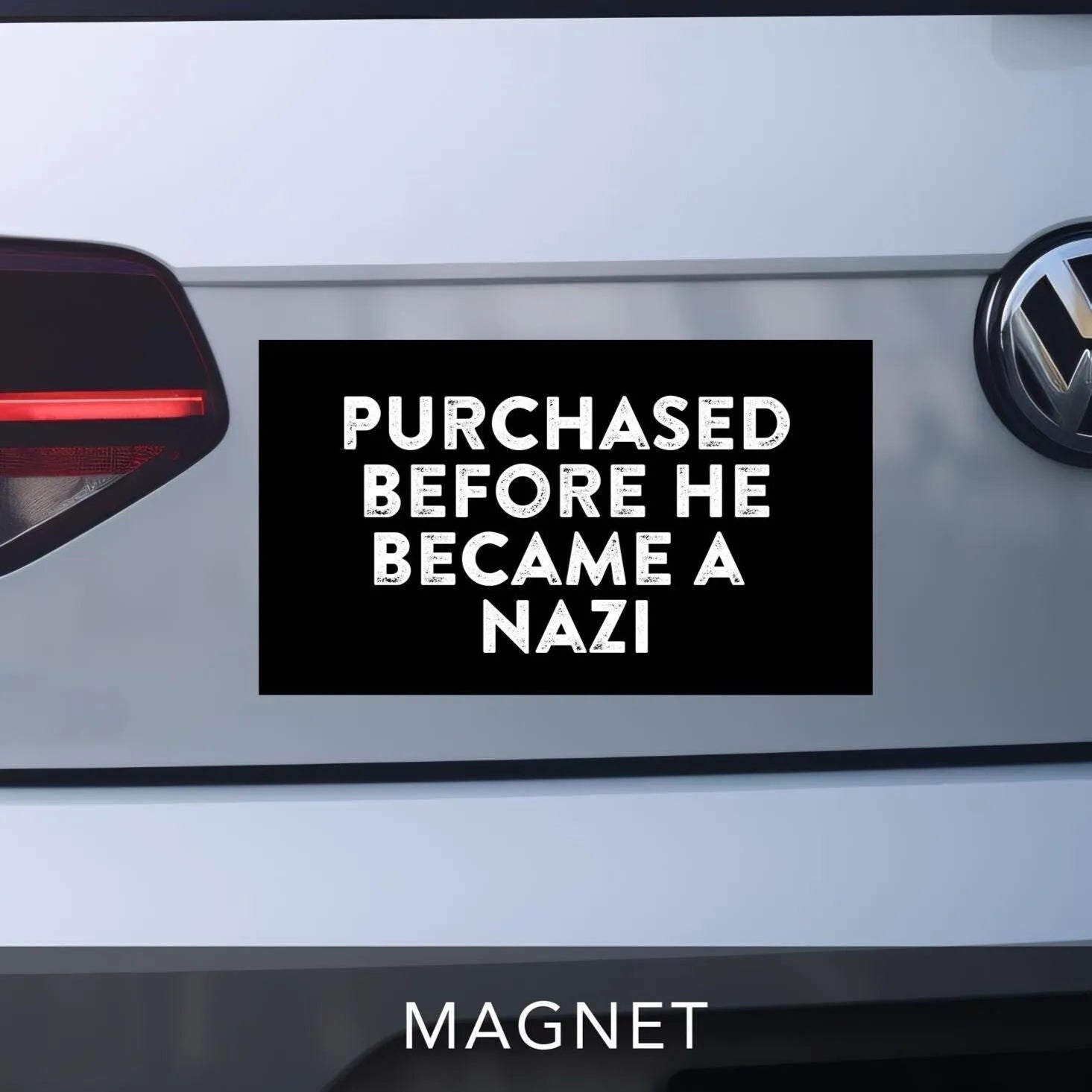 Anti-Elon Car bumper magnet black with white block distressed lettering reads &quot;PURCHASED BEFORE HE BECAME A NAZI&quot;.