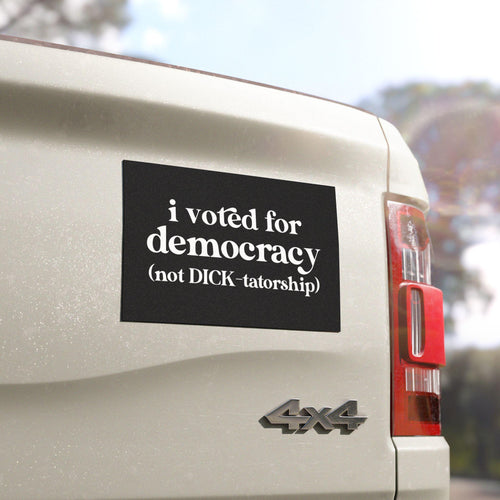 bumper sticker magnet that reads &quot;I voted for democracy (not DICK-tatorship)&quot;.  black background with white modern lettering.