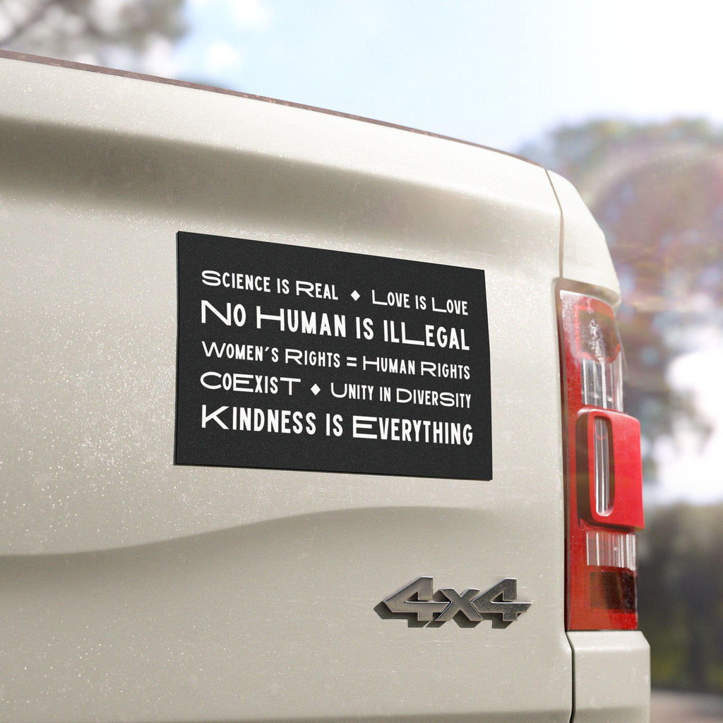 Rectangular black and white car bumper magnet reads: “Science is real, Love is love, No human is illegal, Women’s rights = human rights, Coexist, Unity in diversity, Kindness is everything.”