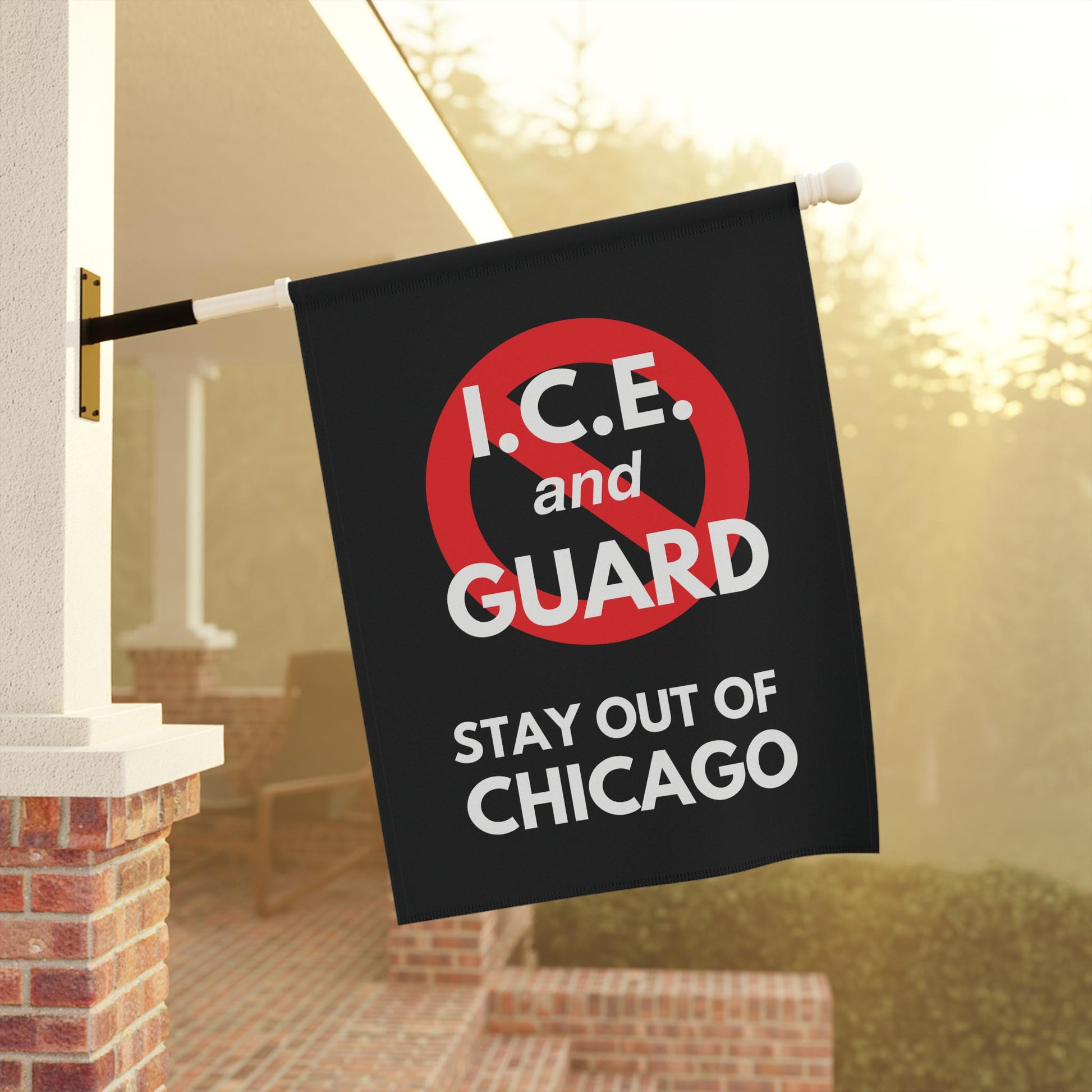 Black protest flag with red circle and slash reading “I.C.E. and Guard Stay Out of Chicago” in bold white text